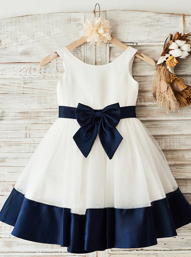white dress with navy blue flowers