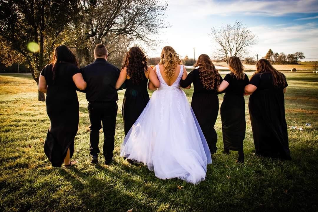 Black bridesmaid dresses farm wedding