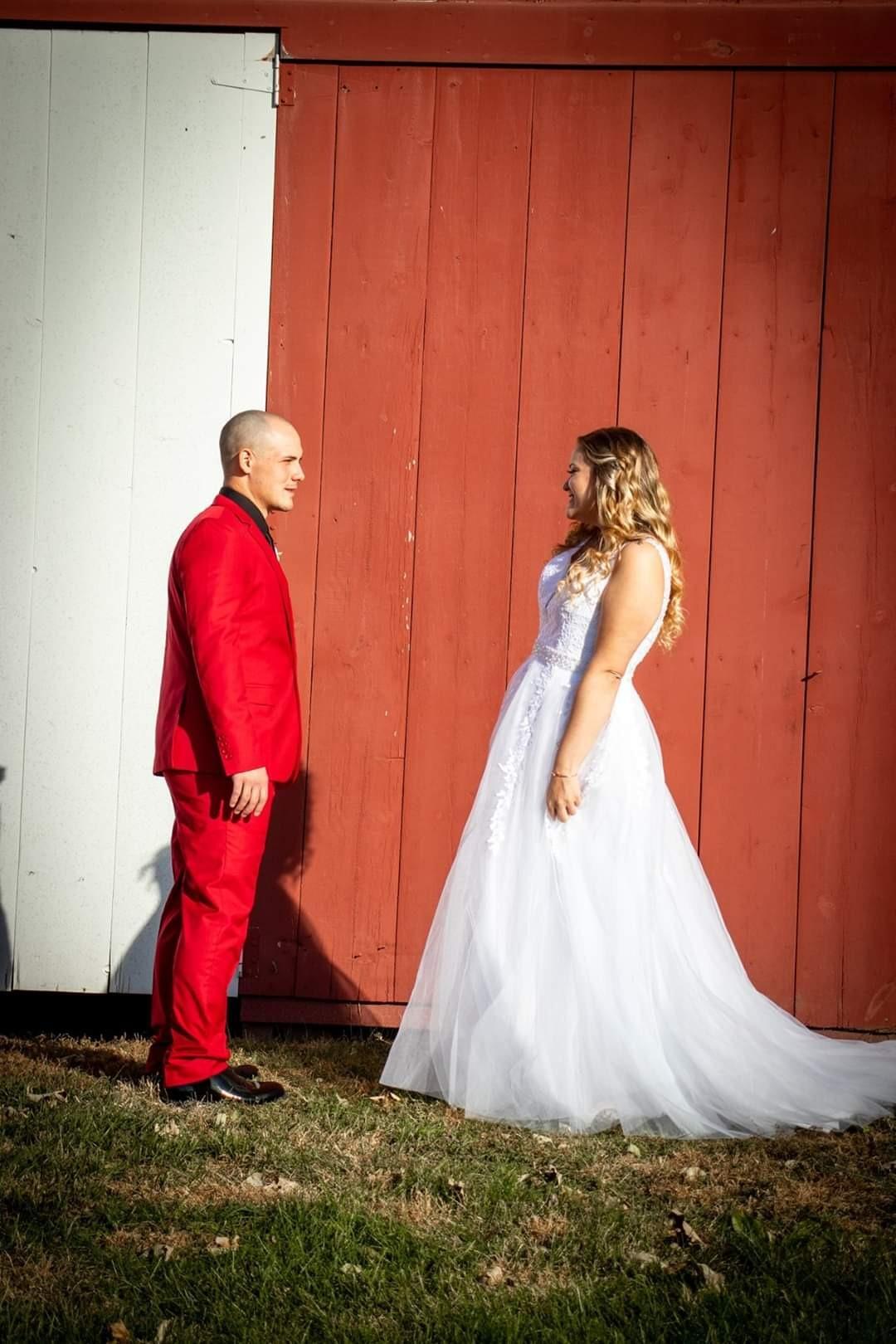 Scarlet red suit wedding groom